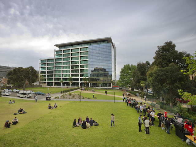 Students use the grassy quad on Monash's campus to hang with friends, study and wait in line for BBQ!
