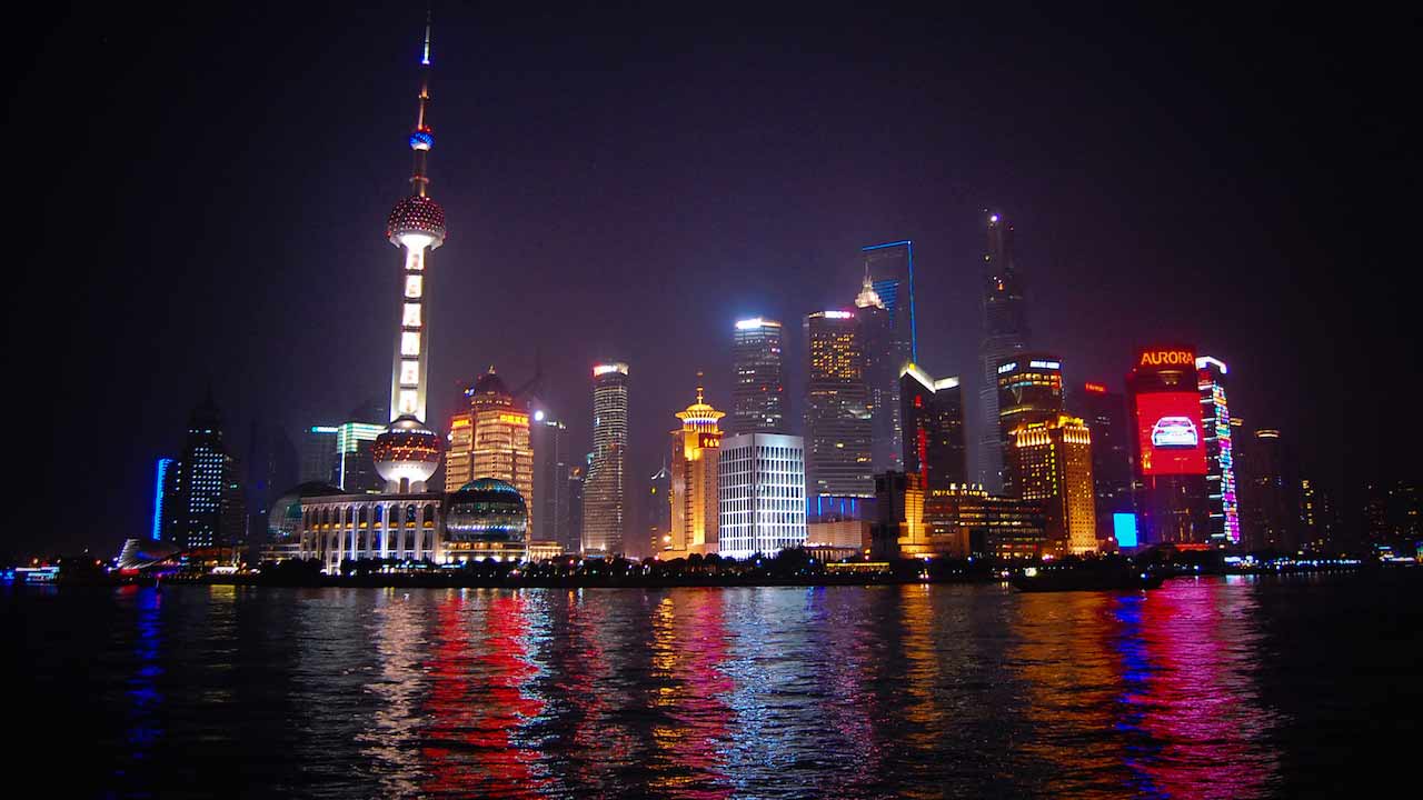 Shanghai's infamous cityscape illuminated colourfully at nighttime