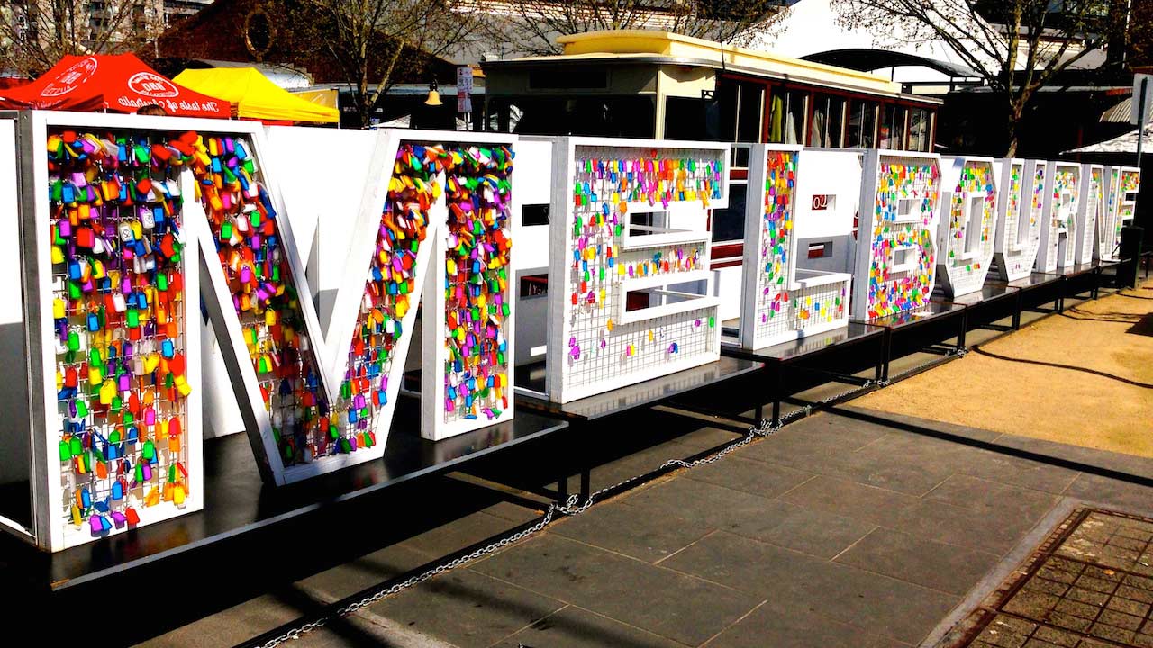 Large colorful block letters spelling Melbourne on the street